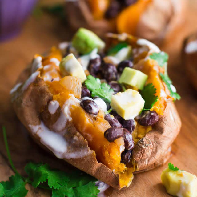 <p>Sweet potatoes aren't just good for you - they're also incredibly satisfying. Bake up a batch and top them with all your favorite ingredients for a totally effortless dinner option.</p><p><strong>Get the recipe at <a rel="nofollow noopener" href="http://bbritnell.com/black-bean-stuffed-sweet-potatoes/" target="_blank" data-ylk="slk:B.Britnell;elm:context_link;itc:0;sec:content-canvas" class="link ">B.Britnell</a>.</strong></p>