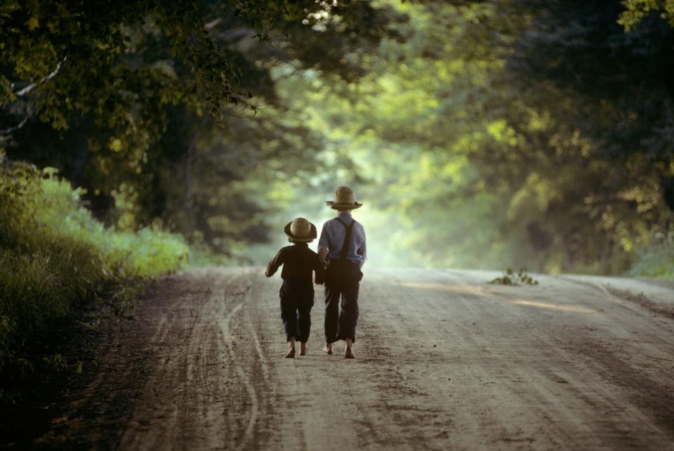 Amish children walking down a road in Pennsylvania, in 1995.