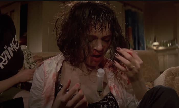 Uma Thurman covered in blood and stabbed with a syringe in "Pulp Fiction"