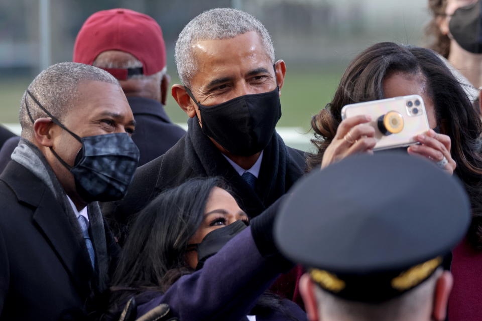 Former U.S. President Barack Obama and wife Michelle Obama arrive before the inauguration of Joe Biden as the 46th President of the United States. (Jonathan Ernst/Pool/Reuters)