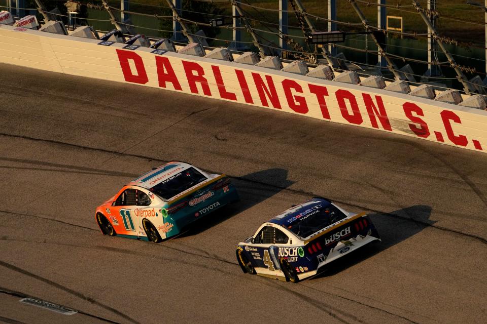 Denny Hamlin (11) and Kevin Harvick (4) were among only a handful of playoff drivers that finished Sunday's Cook Out Southern 500 at Darlington Raceway unscathed.