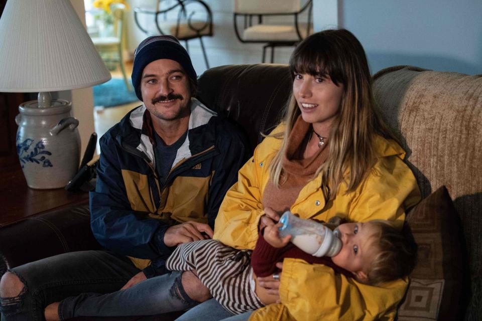 Owners of La Vagabonde, Australian sailors Riley Whitelum (L) and Elayna Carausu (R) with their baby Lenny (AFP via Getty Images)