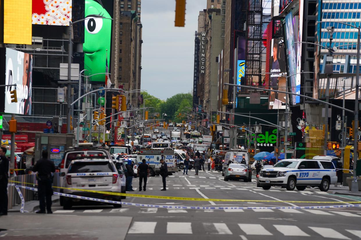 <p>Times Square in New York on March 20, 2020. </p> ((AP Photo/John Minchillo, File))