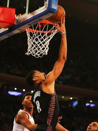 Dec 8, 2018; New York, NY, USA; Brooklyn Nets guard Spencer Dinwiddie (8) lays the ball in against the New York Knicks during the secondhalf at Madison Square Garden. Andy Marlin-USA TODAY Sports