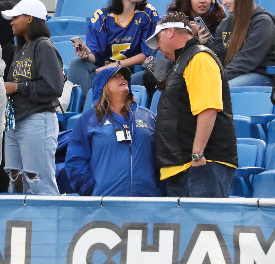 Traci and John Reed watch their son, Jake, and the Hens play against James Madison at Delaware Stadium Saturday, Oct. 23, 2021.