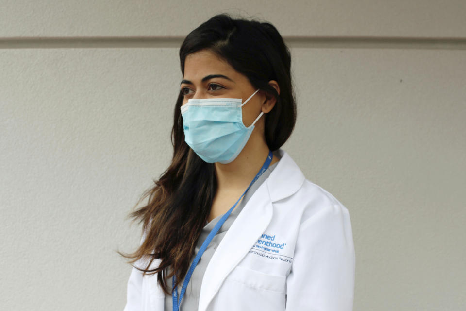 Dr. Meera Shah, the chief medical officer for Planned Parenthood Hudson Peconic, poses for a photo outside a Planned Parenthood center in White Plains, New York, U.S., April 2, 2020. Picture taken on April 2, 2020. REUTERS/Liliana Engelbrecht