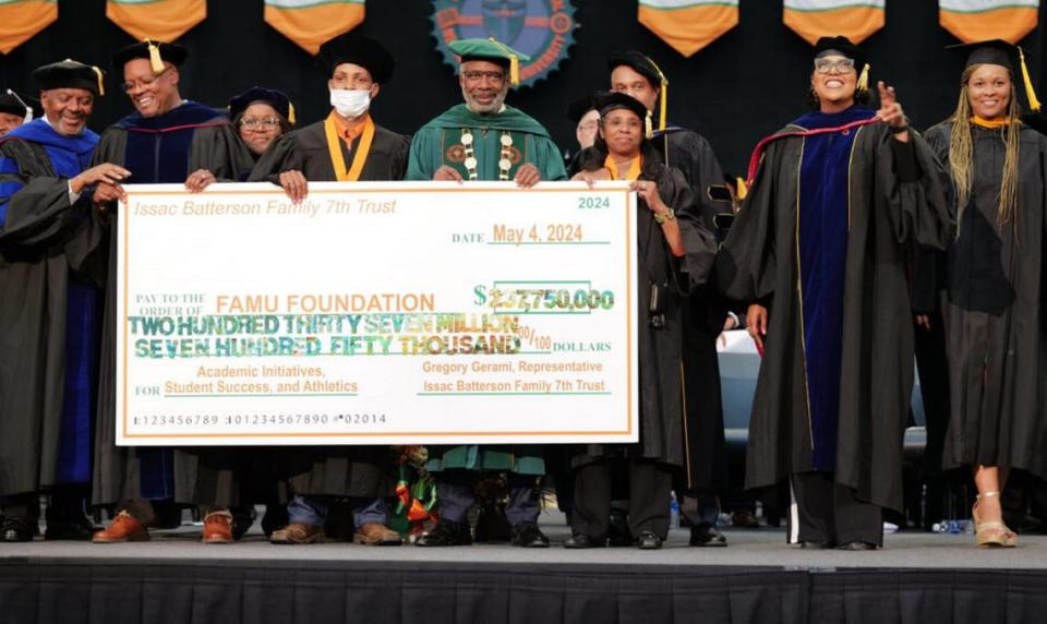 Gregory Gerami, fourth from left, president and CEO of Batterson Farms Corp, recently announced a $237 million donation to Florida A&M University at school’s 2024 graduation ceremony. It’s the largest ever for a historically Black college or university. But many are skeptical after a similar donation he pledged to Coastal Carolina University in 2020 collapsed.