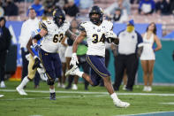 California running back Christopher Brooks runs into the end zone for a touchdown during the first half of the team's NCAA college football game against UCLA on Saturday, Nov. 27, 2021, in Pasadena, Calif. (AP Photo/Jae C. Hong)