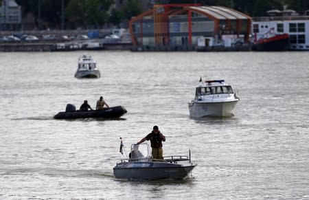 Rescue team continues its search after a tourist boat accident in the Danube river in Budapest