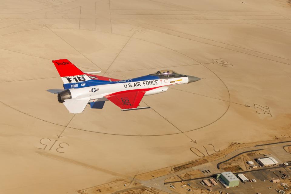 An incredible photo of the 50th anniversary jet high over Edwards AFB's famed lakebed compass. (USAF Viper Demonstration Team)