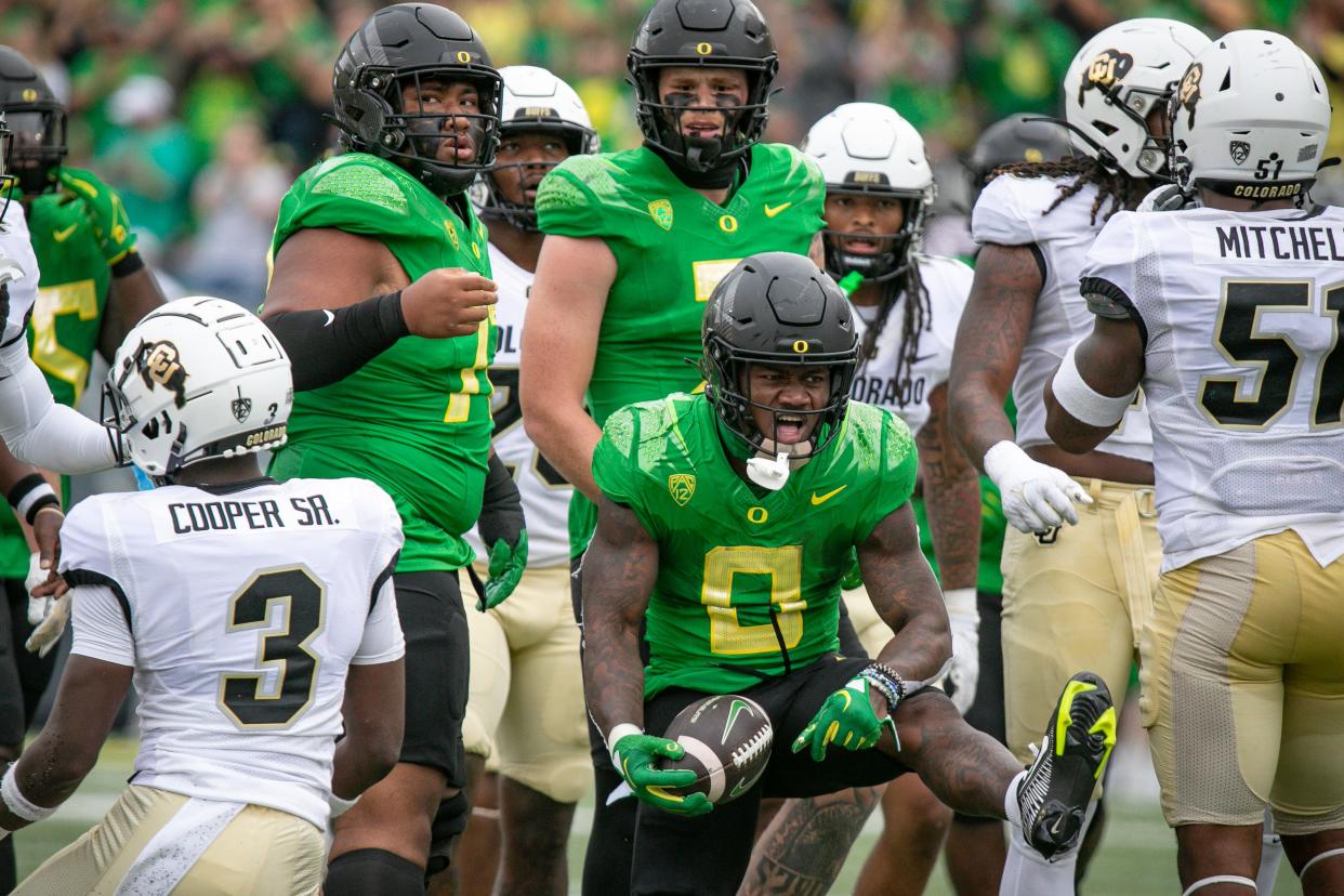 Oregon running back Bucky Irving celebrates a run as the Oregon Ducks host Colorado in the Pac-12 opener Saturday, Sept. 23, 2023, at Autzen Stadium in Eugene, Ore.