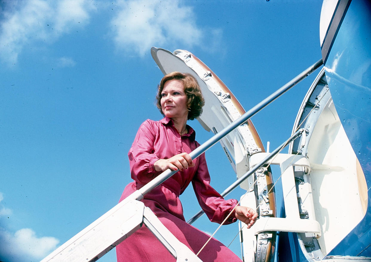 US First Lady Rosalynn Carter climbs the steps to her plane during a trip in Texas in September of 1978. (Diana Walker / Getty Images)