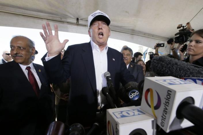 Republican presidential hopeful Donald Trump speaks to the media during a tour of the World Trade International Bridge at the U.S.-Mexico border in Laredo, Texas, July 23, 2015. (AP Photo/LM Otero)