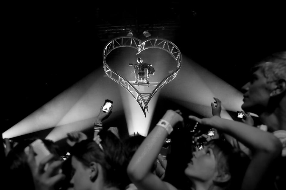 For part of the set Bieber serenades the audience from a floating heart shaped lift where he plays guitar. <b>More on Time.com:</b> <a href="http://www.time.com/time/photogallery/0,29307,2036104,00.html" rel="nofollow noopener" target="_blank" data-ylk="slk:Photos: Grant Achatz, the Culinary Miracle Worker;elm:context_link;itc:0;sec:content-canvas" class="link ">Photos: Grant Achatz, the Culinary Miracle Worker</a>