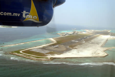 FILE PHOTO: An aerial picture of the airport in Maldives January 10, 2005. REUTERS/Anuruddha Lokuhapuarachchi/File Photo