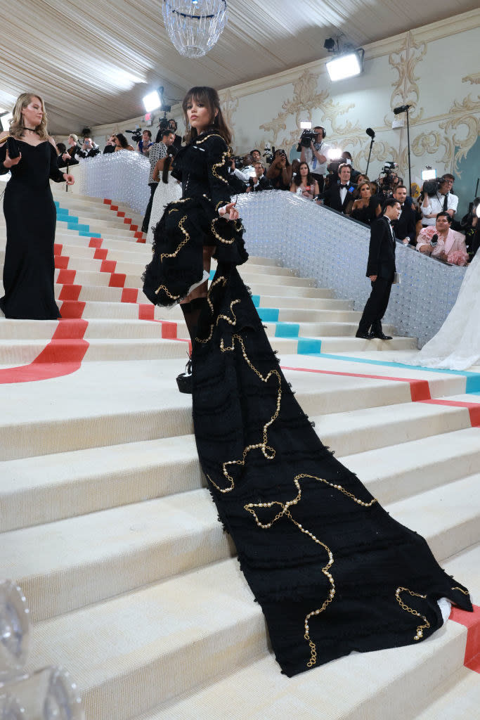 posing with the long train on the stairs