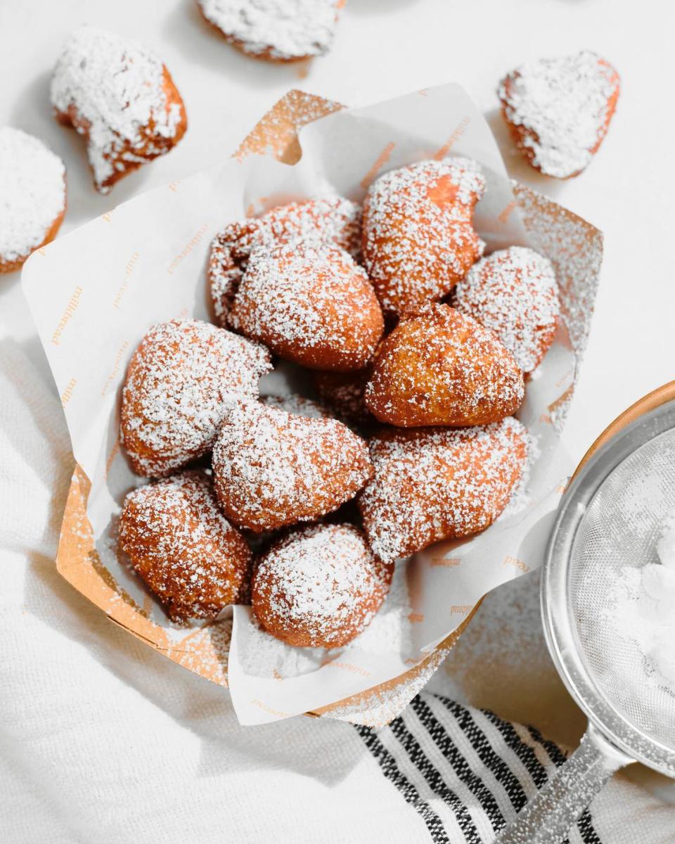 Milkbread’s made-to-order petite beignets coated in powdered sugar.