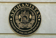 The seal of the embassy of the Islamic Republic of Afghanistan in Washington, Tuesday, May 17, 2022. The United States has taken control of Afghanistan's embassy in Washington and the country's consulates in New York and California. The State Department says it had assumed "sole responsibility" for the security and maintenance of the diplomatic missions effective on Monday and will bar anyone from entering them without its permission. The move came after the department said the embassy and consulates had "formally ceased conducting diplomatic and consular activities in the United States." (AP Photo/Manuel Balce Ceneta)