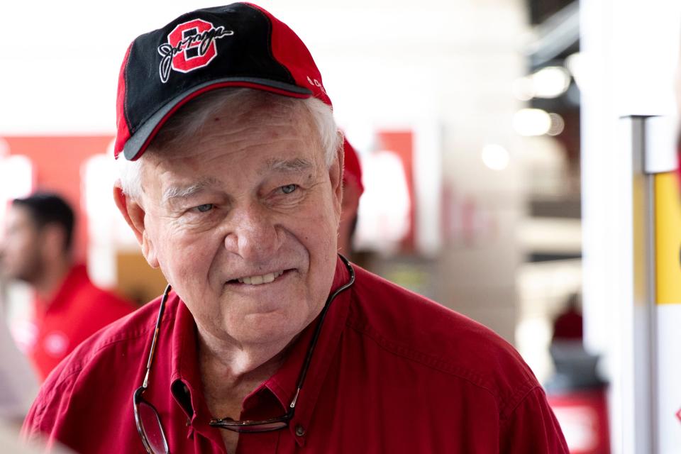 Bob Castellini, Reds president, wears a hat in honor of Joe Morgan before the MLB baseball game between the Cincinnati Reds and the Pittsburgh Pirates on Sunday, Aug. 8, 2021, at Great American Ball Park in Cincinnati. 