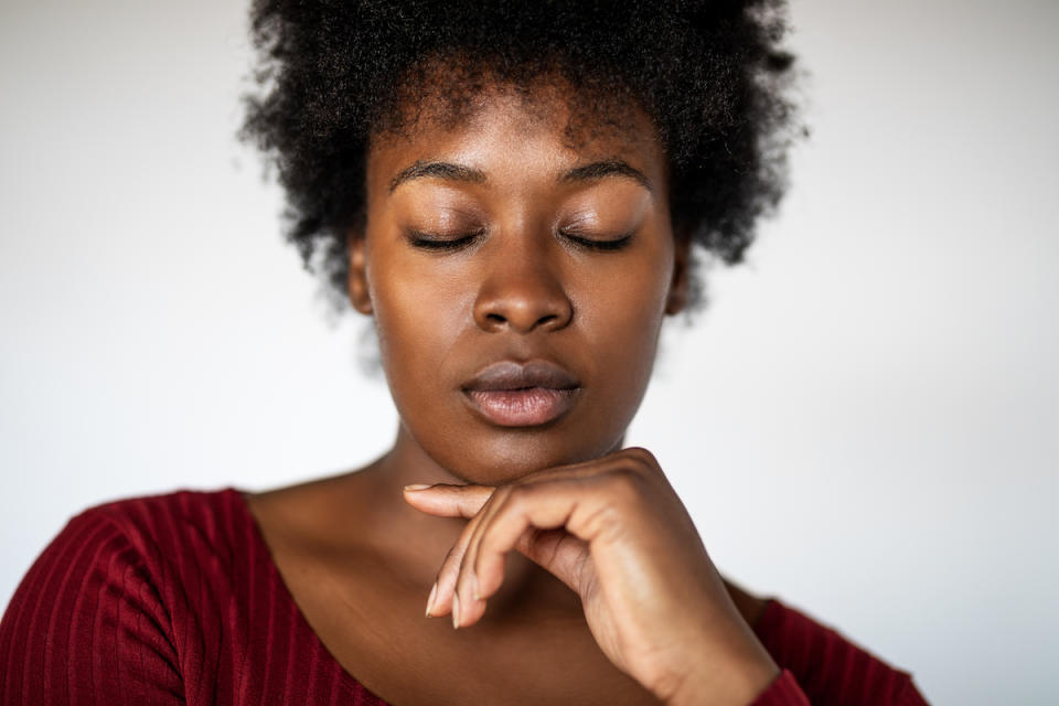 Woman having a moment of calm with her eyes closed