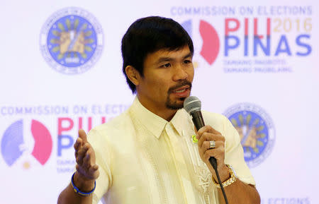 Philippine boxing star and Senator Manny Pacquiao speaks during a news conference after being proclaimed by elections officials as one of the new members of the upper house of Congress in Manila, Philippines May 19, 2016. REUTERS/Erik De Castro