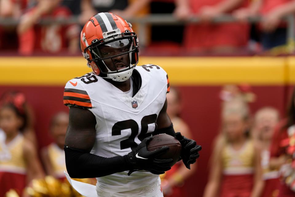 Browns cornerback Caleb Biggers celebrates after intercepting a pass and running it back for a touchdown at the Kansas City Chiefs, Saturday, Aug. 26, 2023.