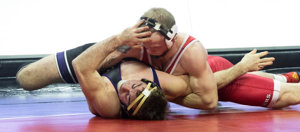 Rutgers' Jackson Turley (top) is the No. 10 pre-seed at 174 pounds in the Big Ten Tournament.