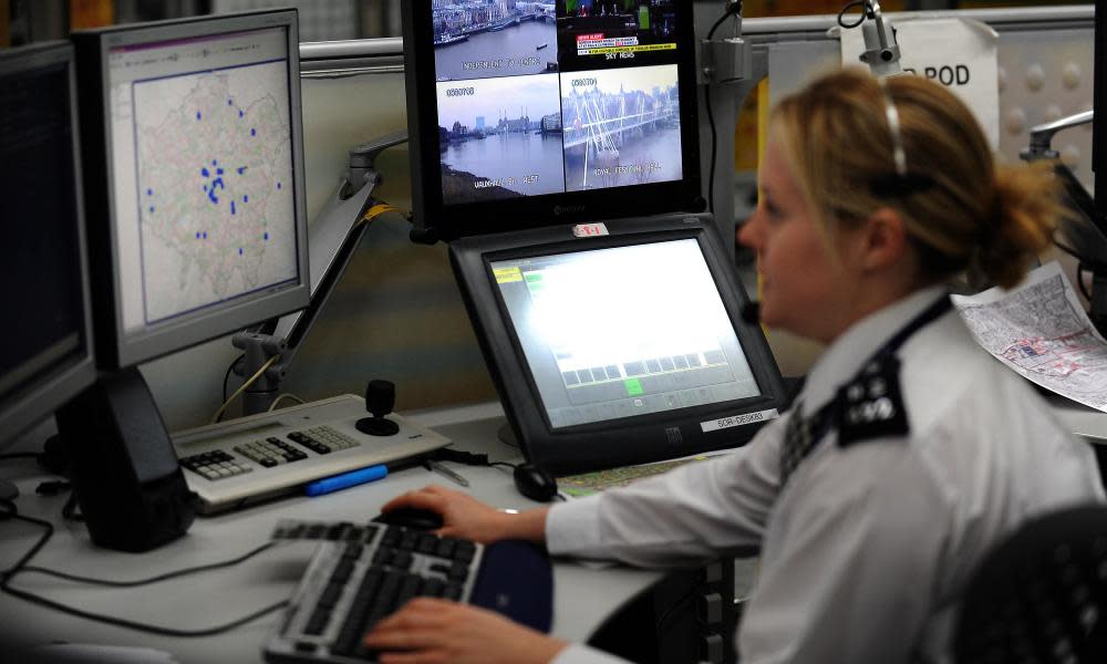 A worker in the Metropolitan police control room