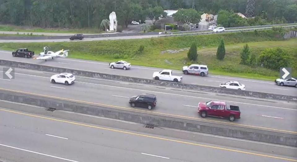 Rescue crews remove a small plane that landed on U.S. 501 Wednesday, May 29, 2024.