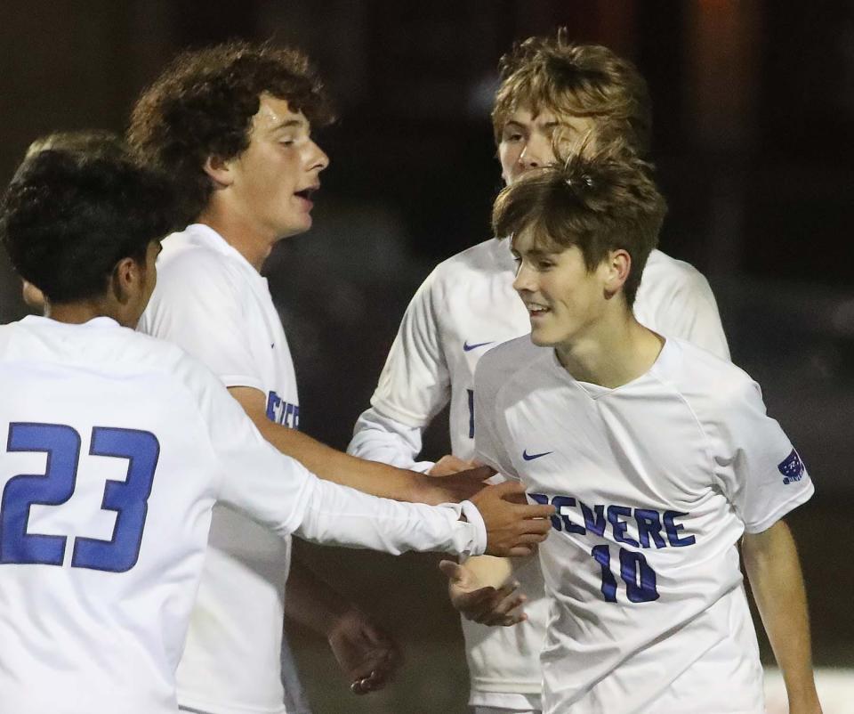 Desmond Johnston, right, of Revere celebrates his goal against Copley with his teammates during the first half of their game at Copley High School on Tuesday night. 