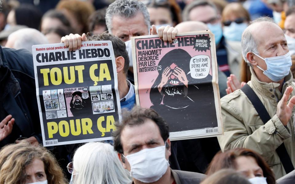 People attended a rally in memory of Samuel Paty over the weekend - Antoine Gyori/Corbis via Getty Images