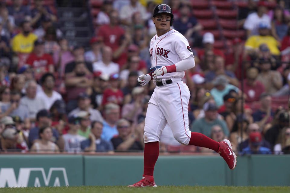 Boston Red Sox's Yu Chang scores on a double by Reese McGuire in the sixth inning of a baseball game against the Kansas City Royals, Sunday, Sept. 18, 2022, in Boston. (AP Photo/Steven Senne)