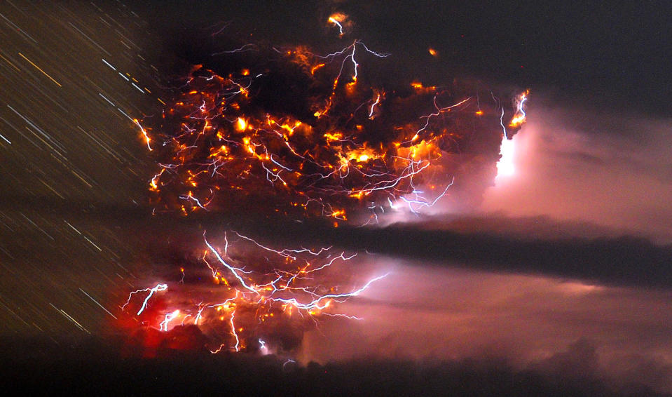 Volcanic lightning is seen over the Puyehue volcano, over 500 miles south of Santiago, Chile, Sunday June 5, 2011. Authorities have evacuated about 600 people in the nearby area. The volcano was calm on Sunday, one day after raining down ash and forcing thousands to flee, although the cloud of soot it had belched out still darkened skies as far away as Argentina. (AP Photo/Francisco Negroni, AgenciaUno)