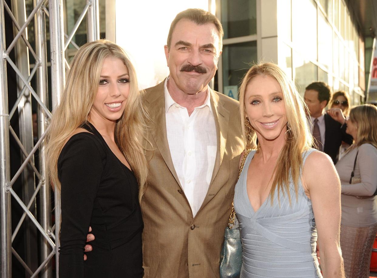 Hannah Selleck, Tom Selleck, and Jillie Mack pose together