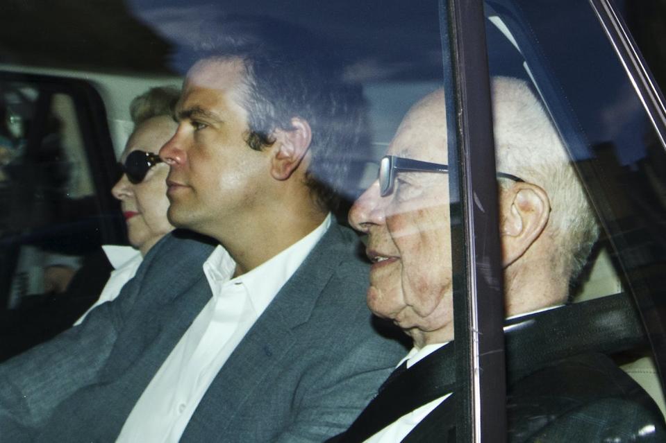 News Corp. chairman Rupert Murdoch, right, and his son Lachlan, center, in 2011. <a href="https://newsroom.ap.org/detail/BritainPhoneHacking/140ab33fab704ff78a8a749681e4bf0f/photo?Query=murdoch%20lachlan&mediaType=photo&sortBy=arrivaldatetime:asc&dateRange=Anytime&totalCount=20&currentItemNo=2" rel="nofollow noopener" target="_blank" data-ylk="slk:AP Photo/Sang Tan;elm:context_link;itc:0;sec:content-canvas" class="link ">AP Photo/Sang Tan</a>