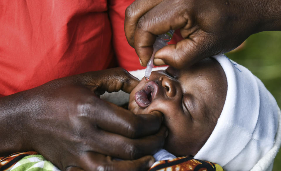 FILE - A baby receives an oral polio vaccine during the Malawi Polio Vaccination Campaign Launch in Lilongwe, Malawi, on March 20, 2022. For years, global health officials have used billions of drops of an oral vaccine in a remarkably effective campaign aimed at wiping out polio in its last remaining strongholds — typically, poor, politically unstable corners of the world. Now, in a surprising twist in the decades-long effort to eradicate the virus, authorities in Jerusalem, New York and London have discovered evidence that polio is spreading there. The source of the virus? The oral vaccine itself. (AP Photo/Thoko Chikondi, File)