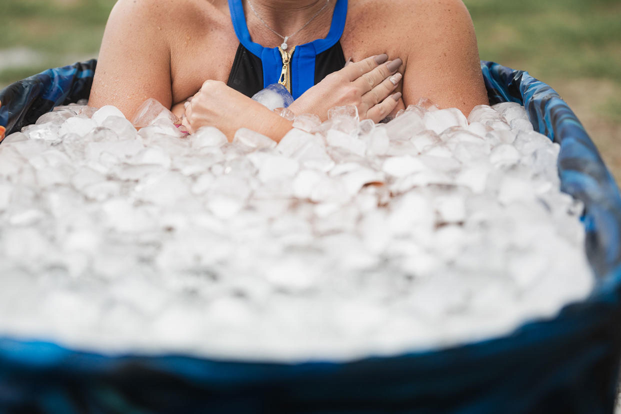 Woman with her arms folded in the cold in an ice bath Getty Images/Ivan Rodriguez Alba