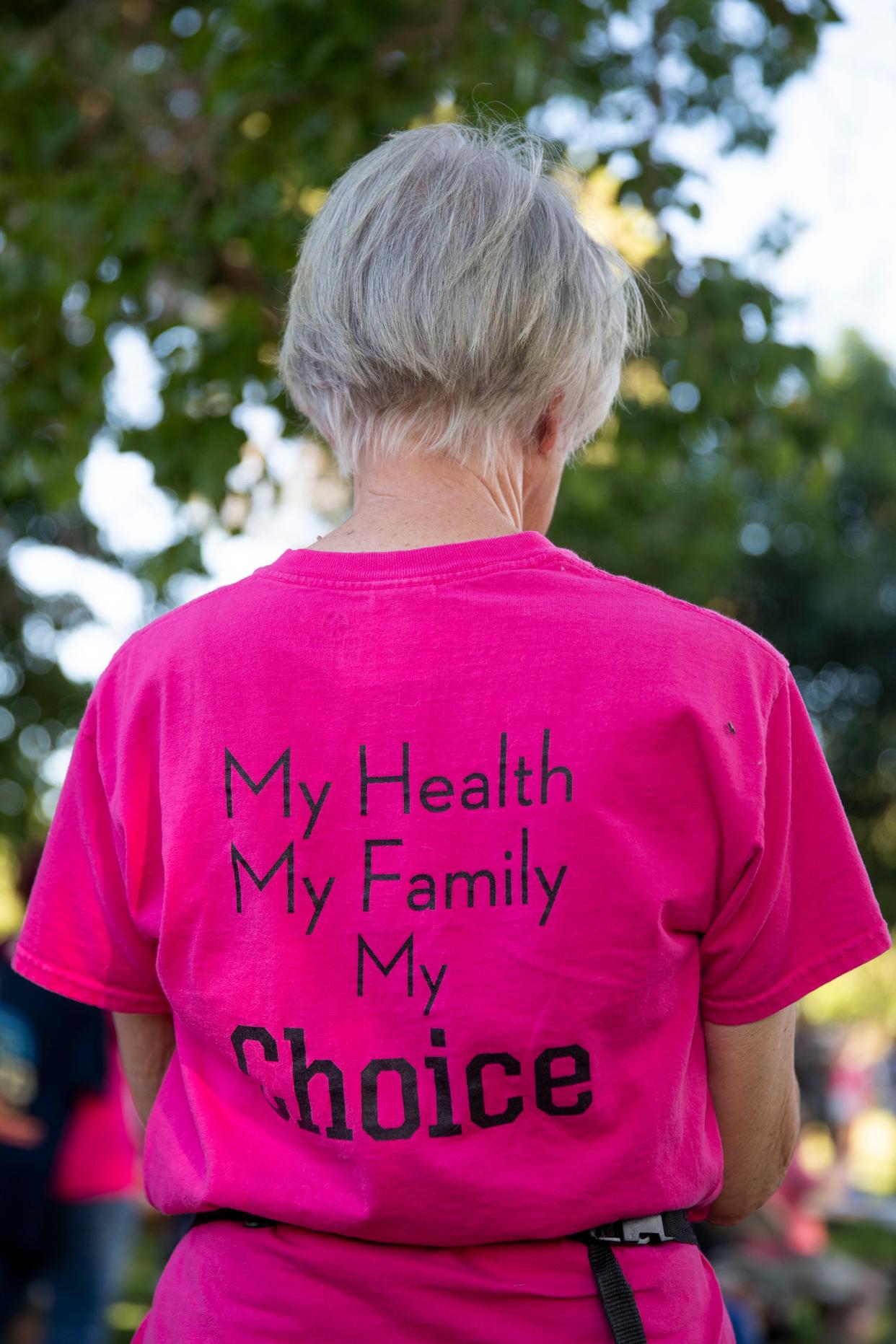 Demonstrators listen to abortion rights activists and other demonstrators share their feelings and fears about the overturning of Roe v. Wade during the Bans Off Las Cruces abortion rights demonstration on Friday, June 24, 2022. 