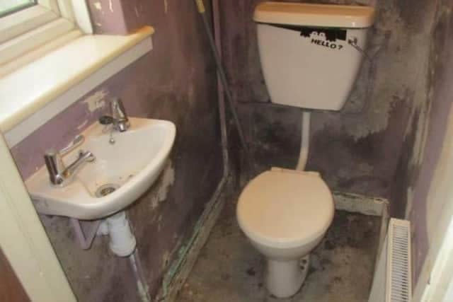 Mould in the toilet meant the family all sharing one bathroom. (SWNS)