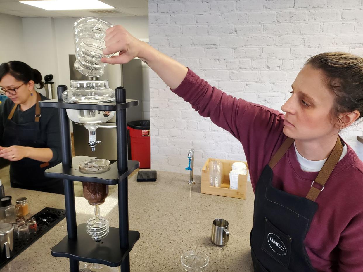 Barista Ashley Morris pours cold water in the Yama Cold Brew Tower at the newly opened Go Make Coffee Co. in Welcome. Journey Church has opened the nonprofit coffee shop to provide quality coffee and give back to the community. The coffee shop plans to purchase two more, larger Yama towers, which take about three hours to make the cold brew espresso concentrate.