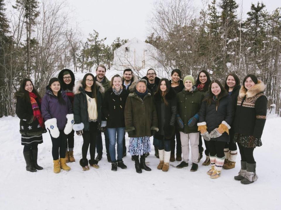 The fifth cohort of Jane Glassco Northern Fellows and their gathering mentor, Be'sha Blondin, seen here in February 2020 in Yellowknife. (Pat Kane/Jane Glassco Northern Fellowship - image credit)