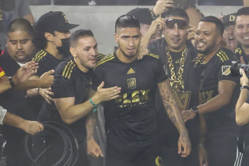 Los Angeles FC forward Cristian Arango (9), celebrates after scoring against the LA Galaxy during the second half of an MLS playoff soccer match Thursday, Oct. 20, 2022, in Los Angeles. Los Angeles FC won 3-2. (AP Photo/Ringo H.W. Chiu)