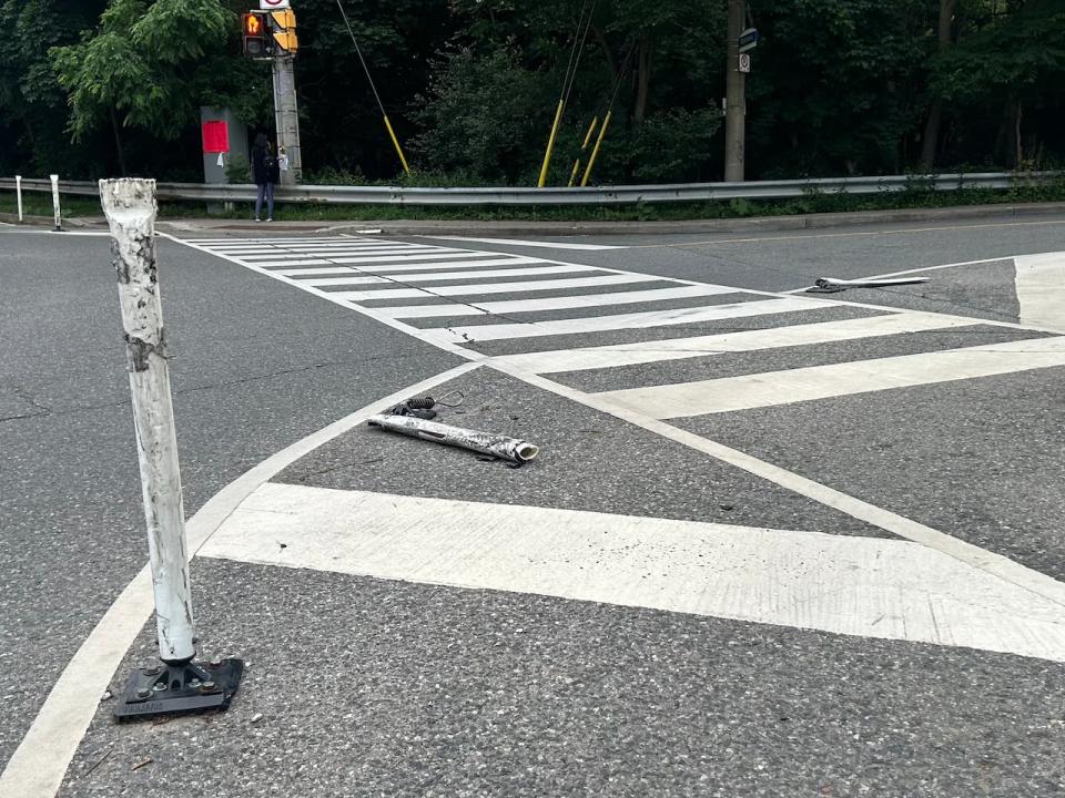 Flex-poles used to protect bike lanes are too often broken and bent - like these examples at the intersection of Nesbitt Drive and Bayview Avenue - Matlow says. 