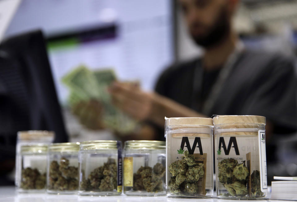FILE - In this July 1, 2017, file photo, a cashier rings up a marijuana sale at a cannabis dispensary in Las Vegas. On Thursday, Feb. 15, 2024, Nevada regulators have issued the first license to operate a lounge where cannabis can be consumed recreationally, marking the first of what are expected to be dozens of such operations. (AP Photo/John Locher, File)