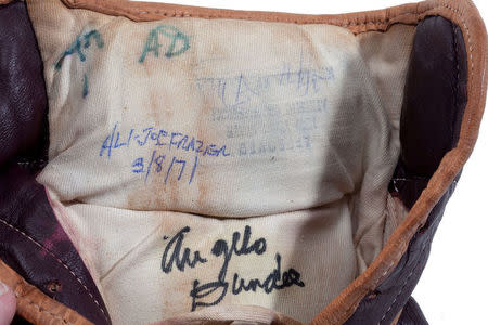 Boxing gloves worn by Muhammad Ali during his March 8, 1971 “Fight of the Century” in Madison Square Garden against Joe Frazier are pictured in this undated handout photo obtained by Reuters July 11, 2016. Goldin Auctions/Handout via REUTERS