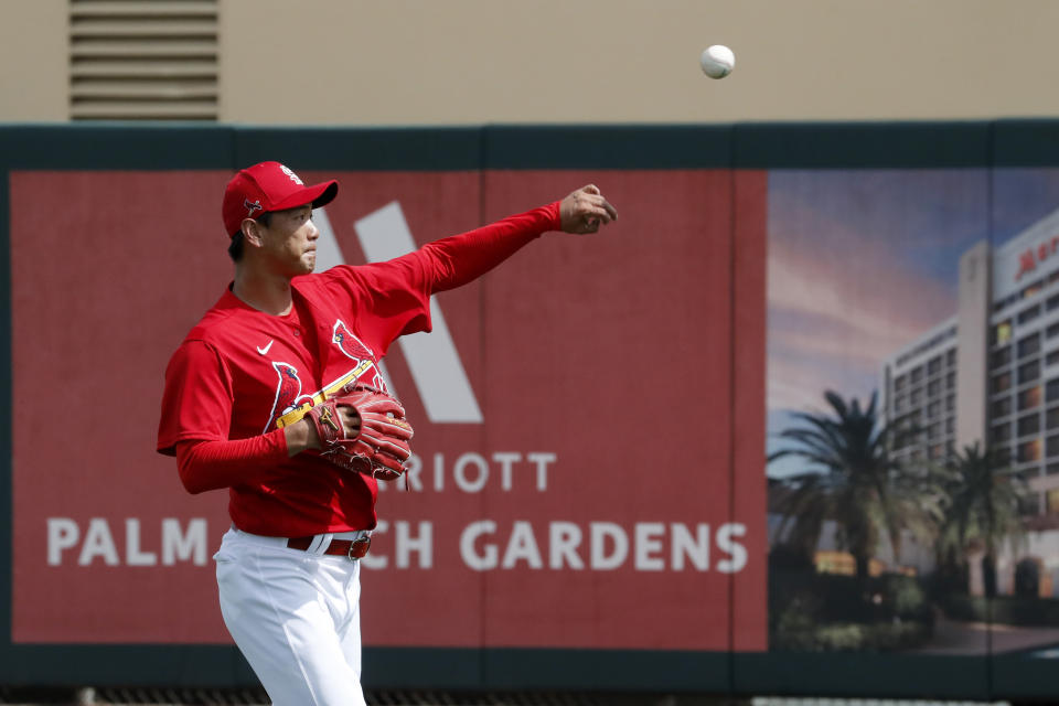 St. Louis Cardinals pitcher Kwang-Hyun Kim warms up before the start of a spring training baseball game against the Miami Marlins Wednesday, Feb. 26, 2020, in Jupiter, Fla. (AP Photo/Jeff Roberson)