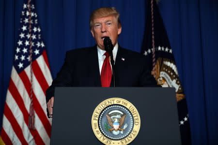 U.S. President Donald Trump delivers an statement about missile strikes on a Syrian airbase, at his Mar-a-Lago estate in West Palm Beach, Florida, U.S., April 6, 2017. REUTERS/Carlos Barria