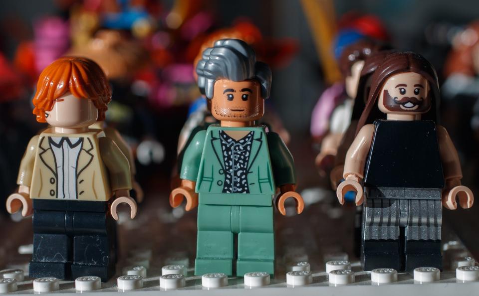 Various Lego minifigures sit for sale Monday, Nov. 29, 2021, inside It's A Block Party in Indianapolis. The store specializes in Lego products, selling sets and individual pieces by the cup or pound. They also purchase Lego sets. 