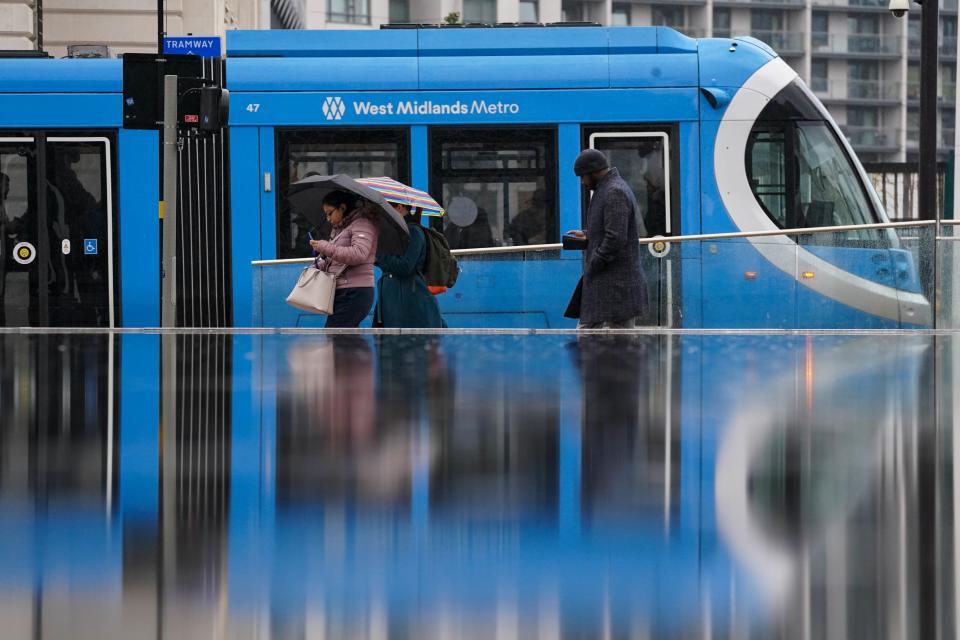 A wet morning in Centenary Square, Birmingham (PA)