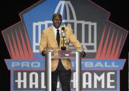 FILE - Former NFL player Terrell Davis delivers his speech during induction ceremonies at the Pro Football Hall of Fame, Saturday, Aug. 5, 2017, in Canton, Ohio. Davis is the only running back with back-to-back Super Bowl titles, an MVP trophy, a Super Bowl MVP honor, a 2,000-yard season and seven consecutive playoff wins in which he topped 100 yards rushing, a man John Elway credited with helping him finally win it all after three Super Bowl losses.(AP Photo/David Richard, File)